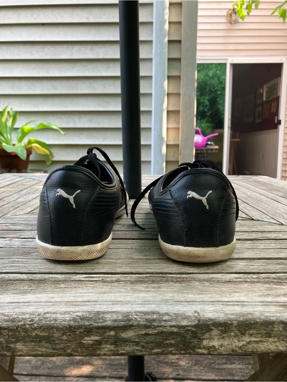 Puma Men's Black Leather Boat Shoes with White Trim